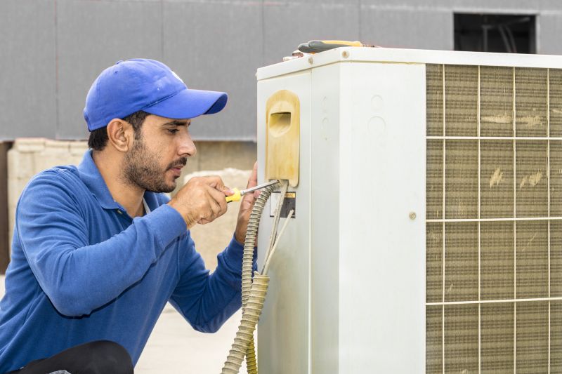 Hvac technician performing system inspection